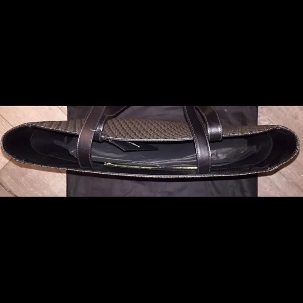Saint Laurent retails $1450